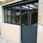 porte d'entrée et baie atelier exterieure